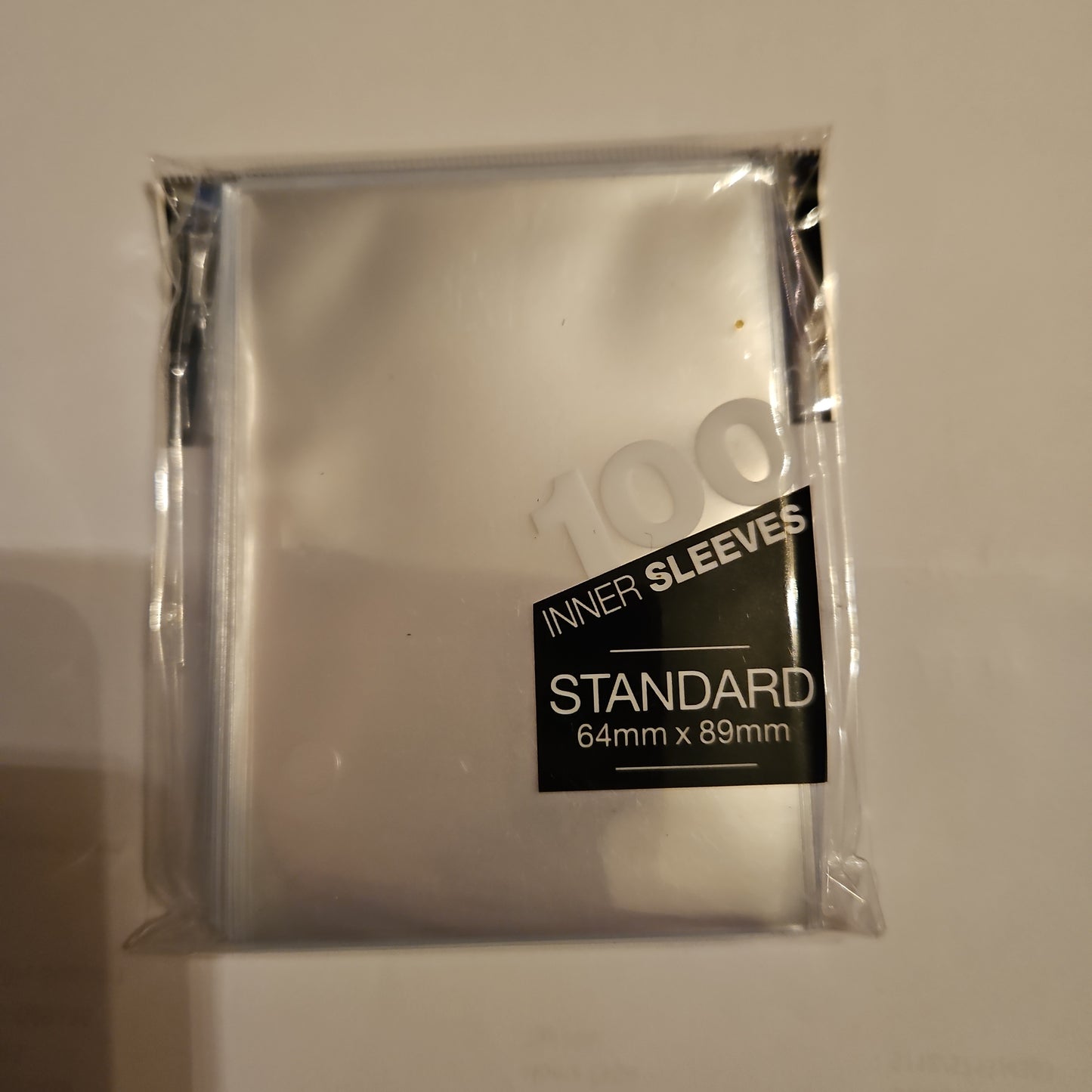 Ultra Pro Standard Pro- fit 100 st - (64x89 mm) clear